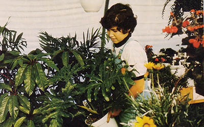 Eleven year old Johnny helps tend plants too.